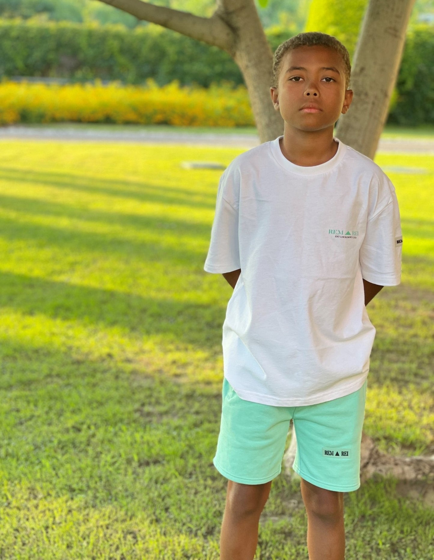 Unique designer boys green shorts perfect for summer and winter holidays. Boys shorts with drawstring waist and side pocket.