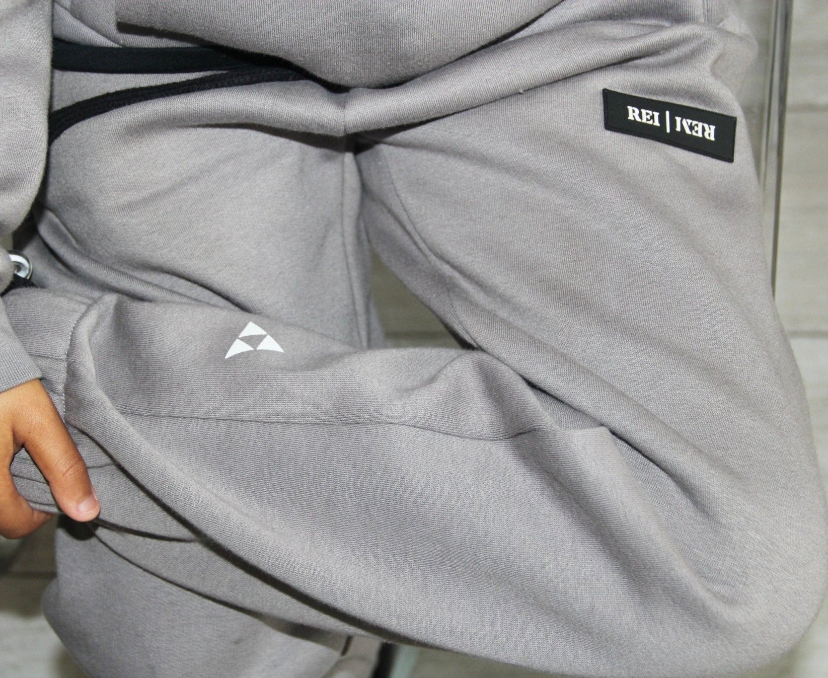 kids designer grey jogging bottoms. boys fleece lined joggers. junior tracksuit set. smart boys outfit, casual boys outfit