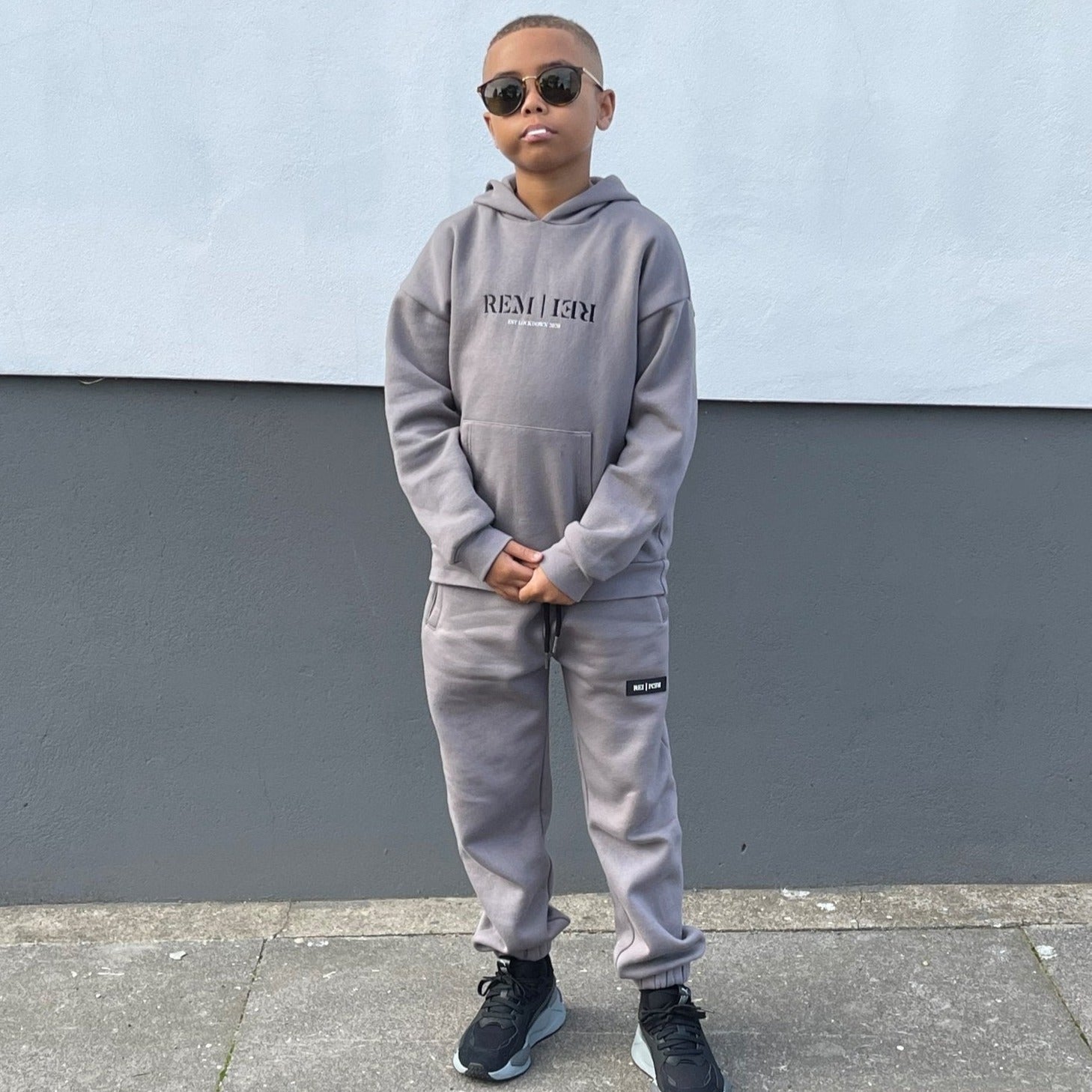 kids designer grey jogging bottoms. boys fleece lined joggers. junior tracksuit set. smart boys outfit, casual boys outfit