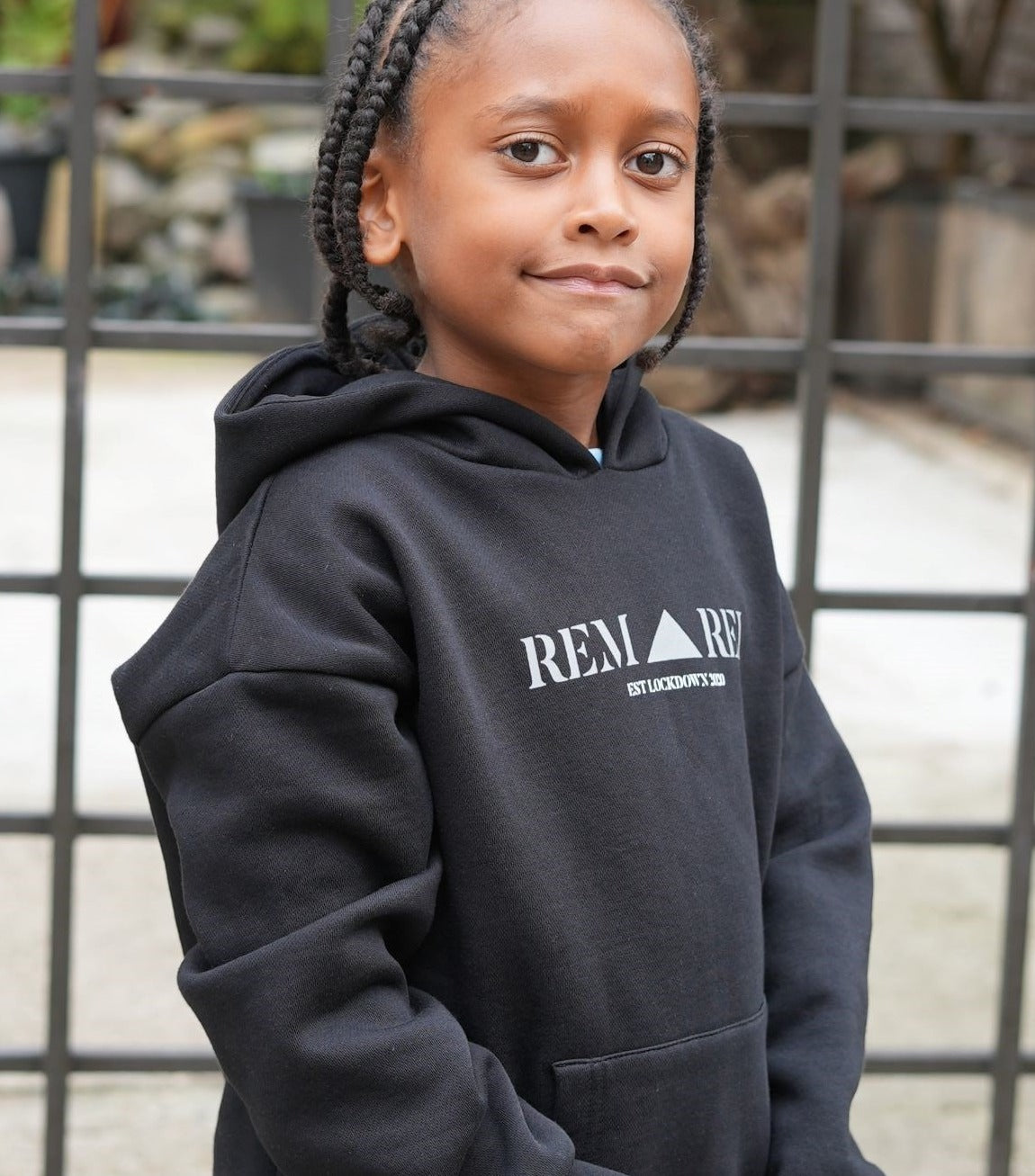 Boys designer black fleece lined hoodie. Stylish hoodie with reflective print on the front. made ethically. Boys, junior tracksuit set