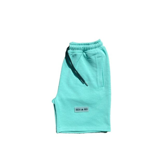 Unique designer boys green shorts perfect for summer and winter holidays. Boys shorts with drawstring waist and side pocket.